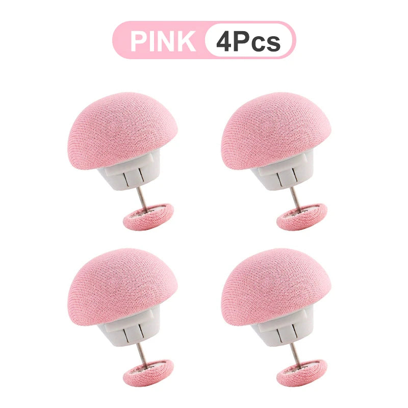 Four pink anti-slip bedsheet quilt clips shown individually on a white background.