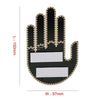 A black finger light module with a cutout for a light source, featuring a five-finger design.