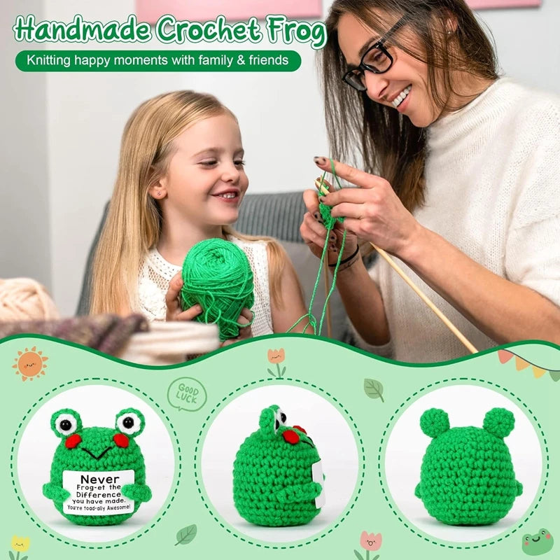 A woman is crocheting a frog toy for a child, surrounded by finished crochet frogs.