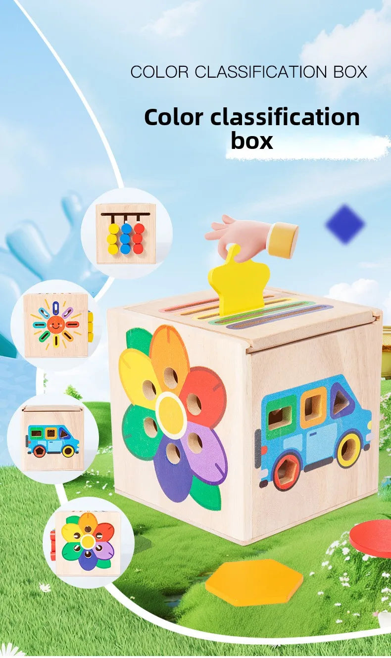A wooden color classification box with various colored shapes and a yellow sorting tool, set in a grassy outdoor context.