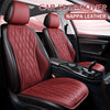 A close-up view of a red Nappa leather car seat cover installed in a vehicle interior.