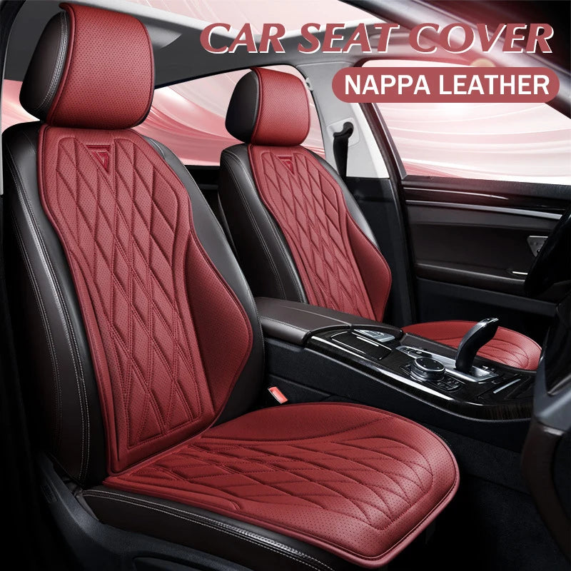 A close-up view of a red Nappa leather car seat cover installed in a vehicle interior.