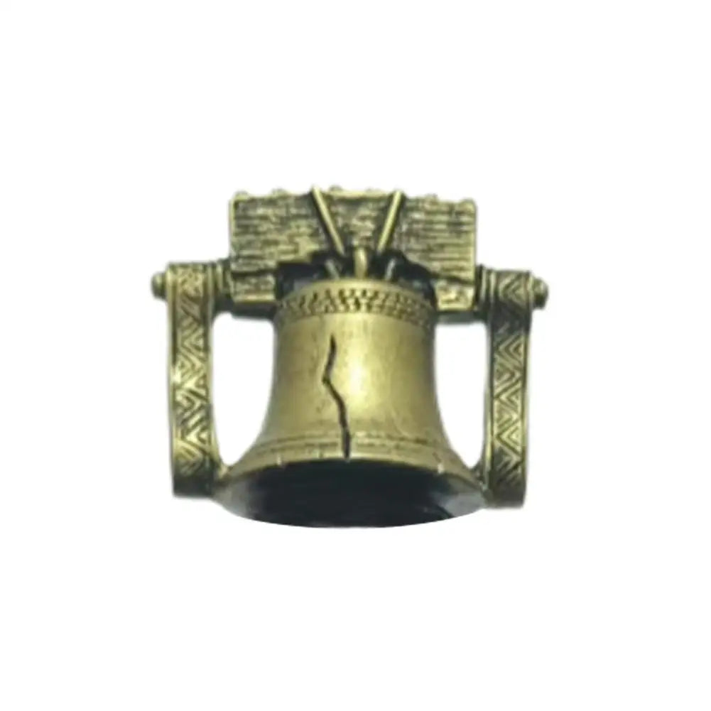 A brass glass decanter with a stopper and decorative elements.