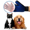 A pair of blue silicone pet grooming gloves is shown next to a black cat and a golden retriever dog.