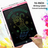A hand holds a pink LCD writing tablet displaying colorful handwriting of a Christmas stocking.