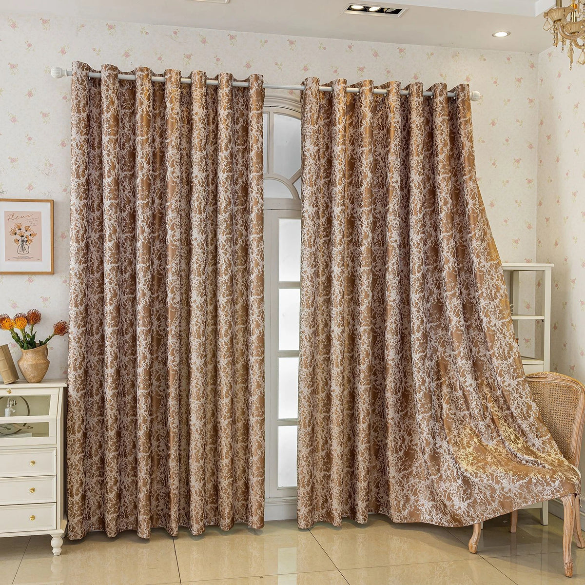 A pair of brown tree bark jacquard blackout curtain panels hanging in a light-colored room.