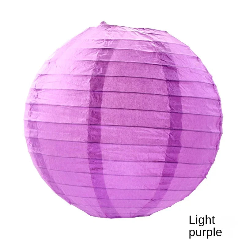 A light purple round paper lantern.