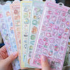 A collection of pink and pastel jelly stickers featuring cute cartoon animals and ghost rabbits.