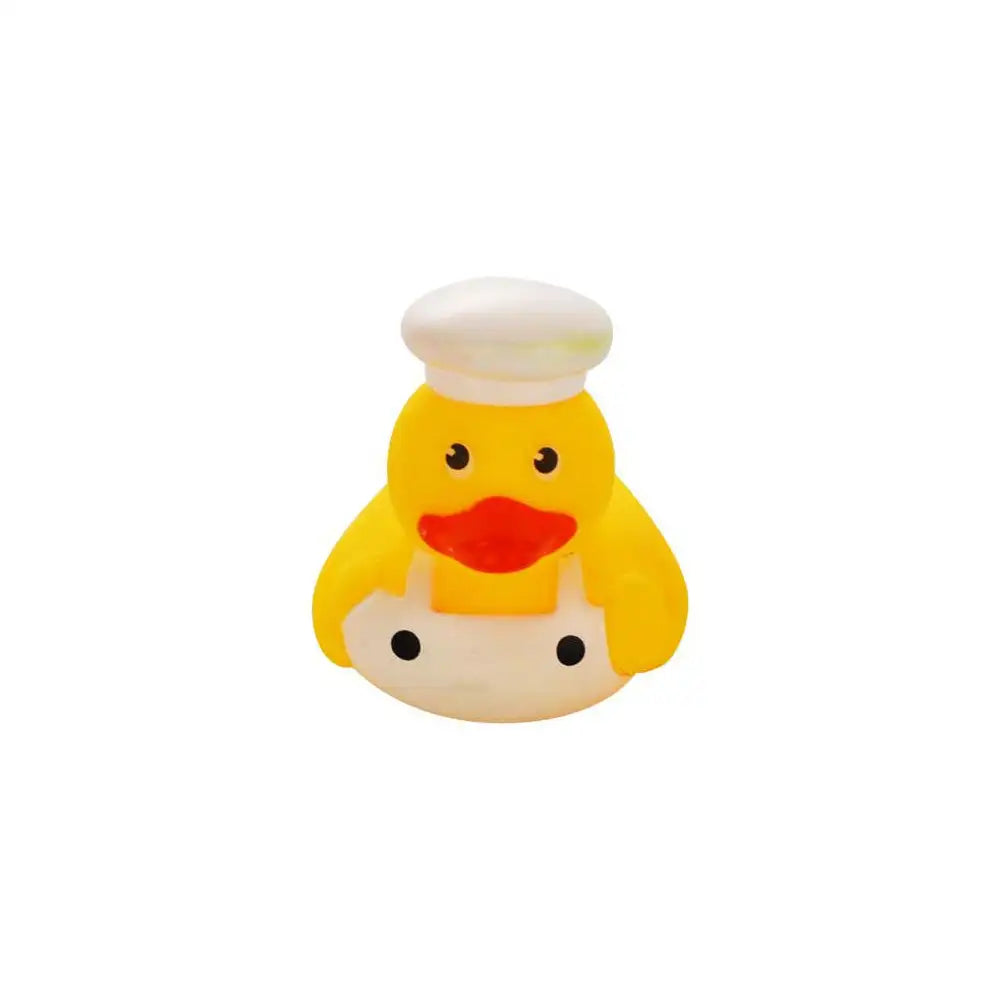 A yellow rubber duck bath toy with a white cap and orange beak.