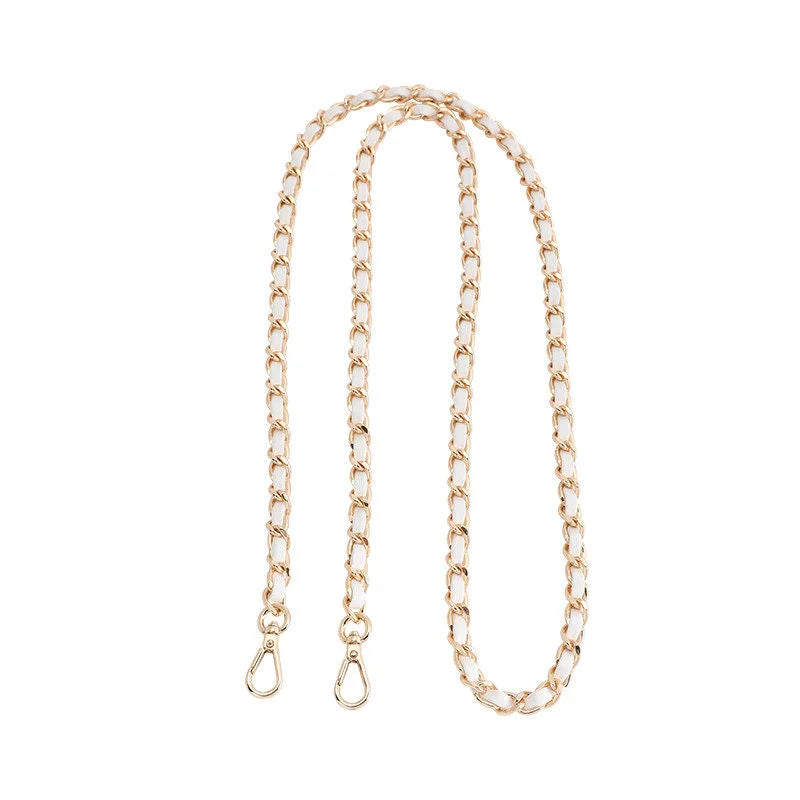 A delicate gold-toned chain shoulder strap buckle for crossbody bags.