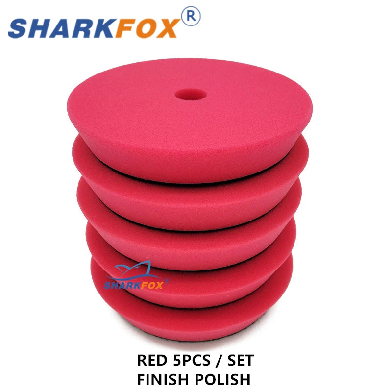Set of five red finishing polish foam pads for car polishing