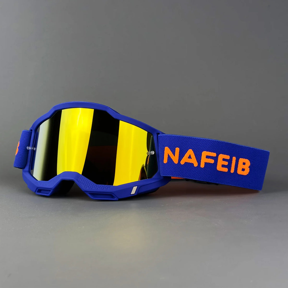 Blue professional MX off-road goggles with yellow polarized lenses and an orange strap.