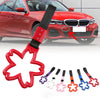 Red cherry blossom tow strap with steel hook shown attached to a BMW car grille.