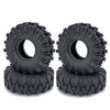 A pair of black rubber mud terrain tires for Axial SCX24 and TRX4M