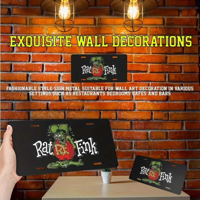 A black metal sign featuring a green rat figure and the text Rat Fink mounted on a brick wall.