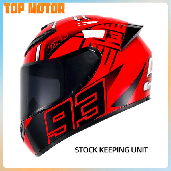 Red and black full face motorcycle helmet with a graphic design, shown from the front.