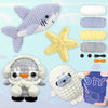A beginner crochet kit featuring various cute animal amigurumi patterns including a shark, starfish, and a fluffy creature.