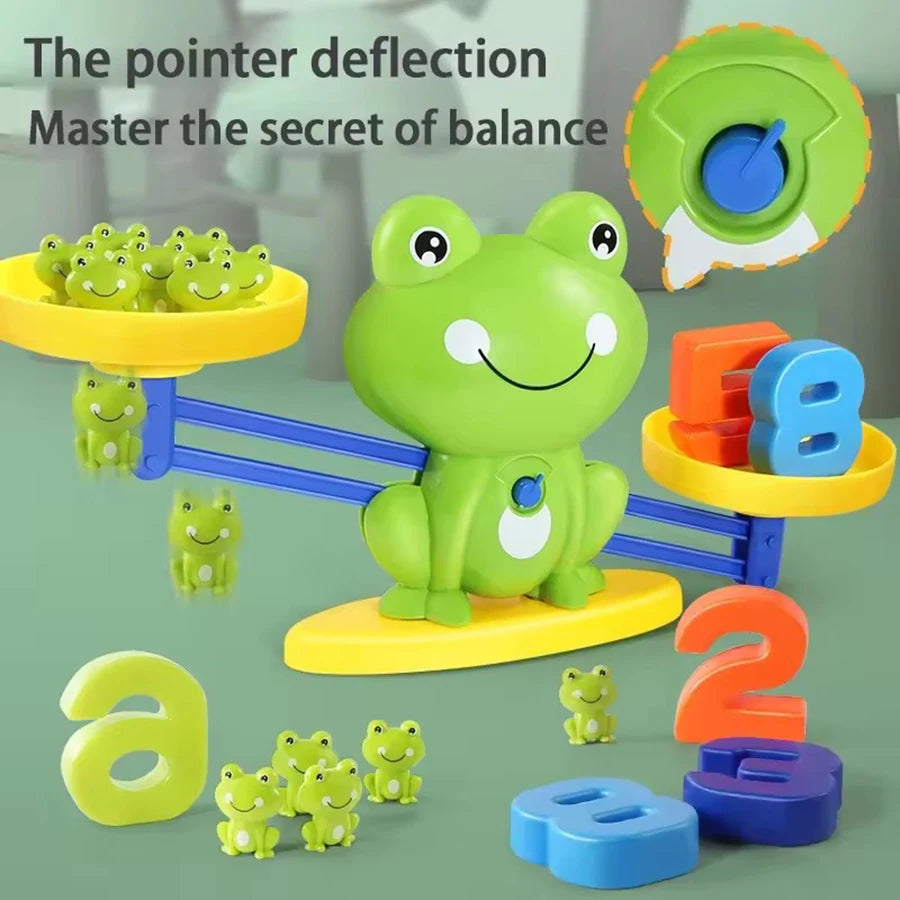 A green frog toy is shown balancing on a blue track, surrounded by other small frogs and number blocks.