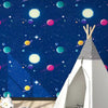 A dark blue wallpaper featuring a vibrant space scene with colorful planets and stars, displayed next to a white tent structu