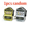 Two silver and gold lucky slot machine keychains with fruit symbols and a jackpot display
