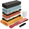 A complete whetstone sharpening kit with stacked sharpening stones and a bamboo base.