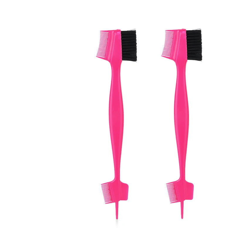 A pair of bright pink edge control brushes for shaping hairlines and wigs.