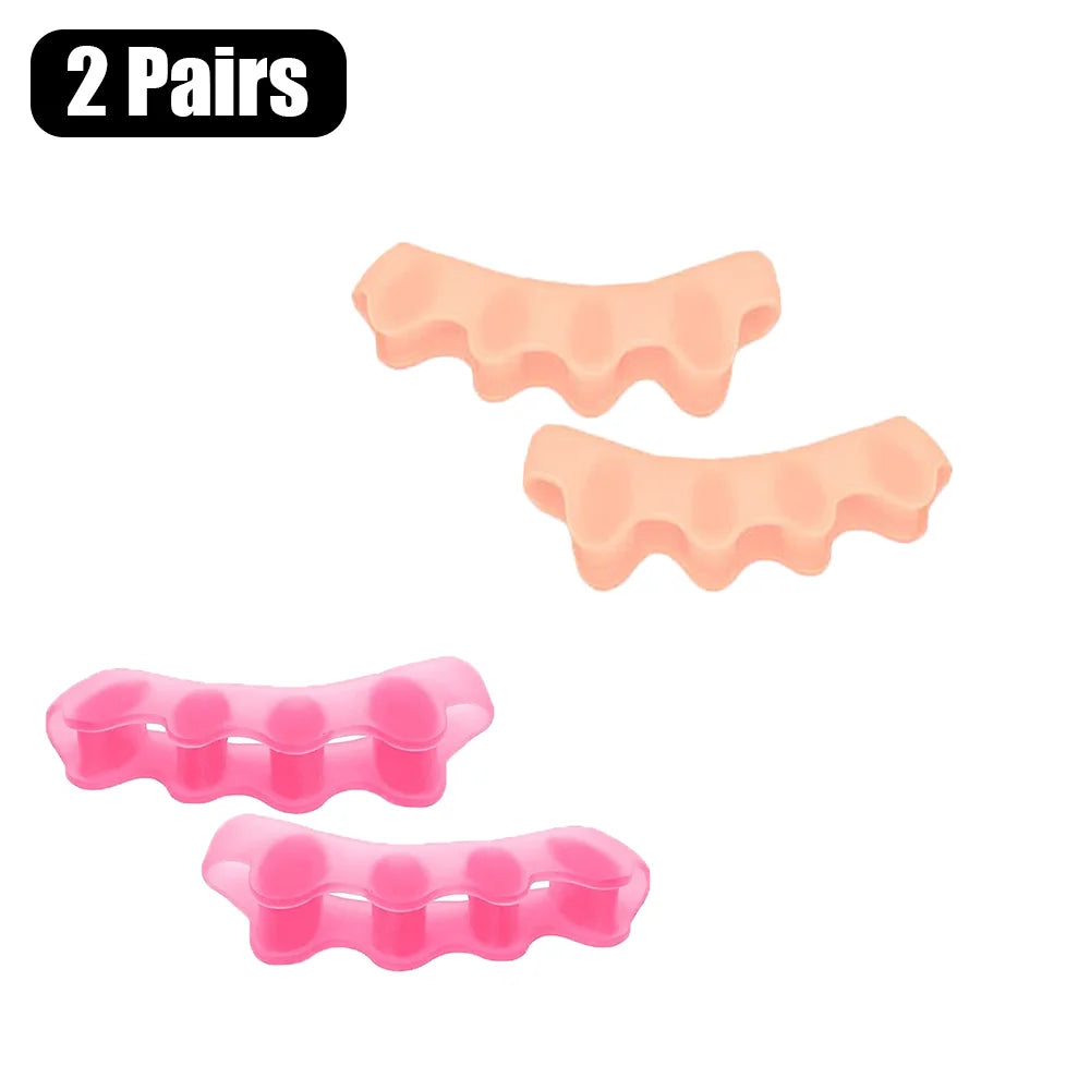 Two pairs of soft pink silicone toe separators for foot alignment and bunion relief