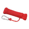 Red fishing magnet with an eyebolt attached, coiled and ready for use.