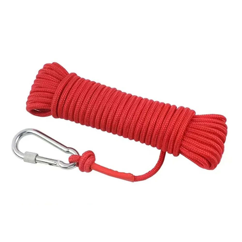 Red fishing magnet with an eyebolt attached, coiled and ready for use.