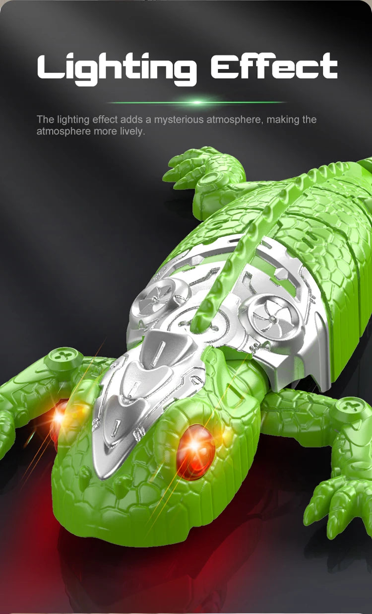 A green gecko toy with silver armor and glowing red LED eyes is shown against a dark background.