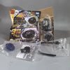 A set of four metal spinning tops and packaging for the Diablo Tempest series.