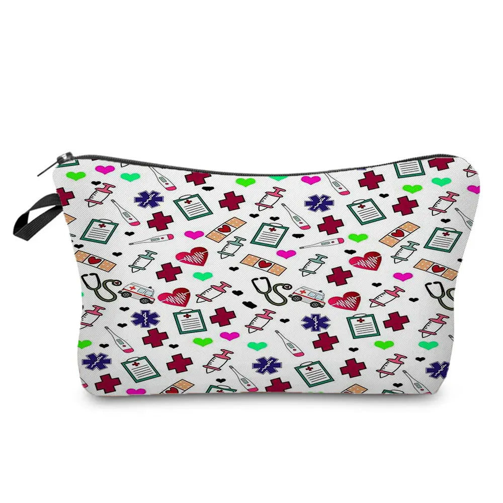 A pink and green ECG print nurse-themed makeup bag with a zipper closure.