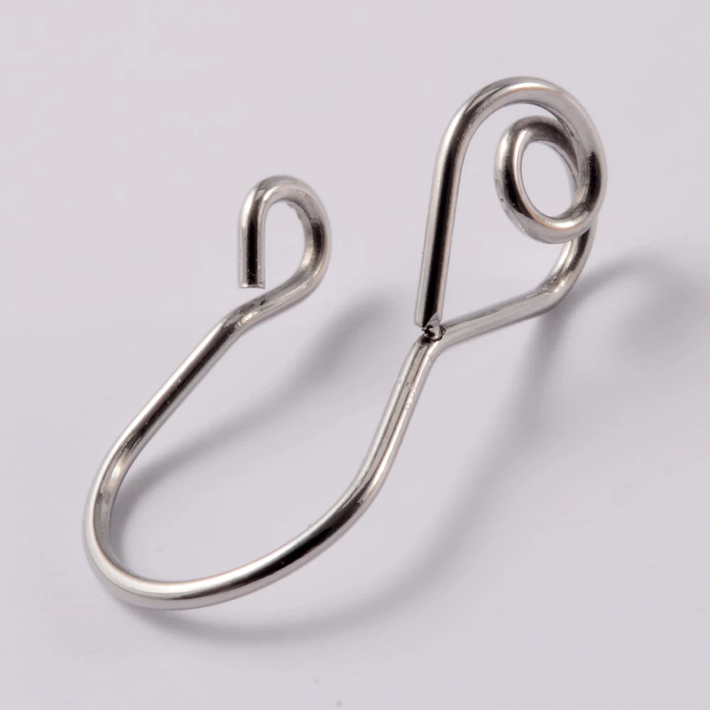 A silver spiral non-piercing nose ring made of surgical steel.