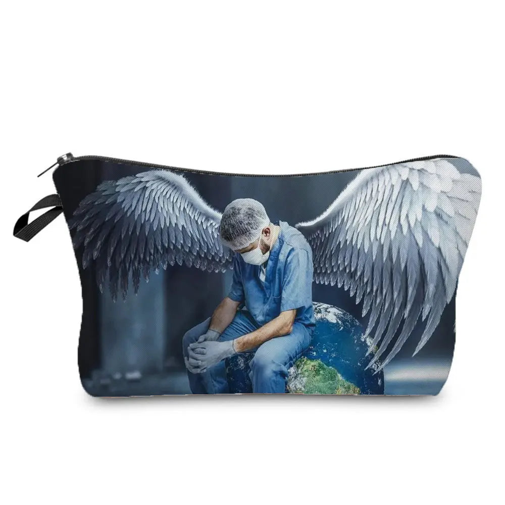 A black makeup bag featuring a printed design of angel wings and a person wearing a face mask.