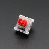 A close-up view of a red Outemu mechanical keyboard switch, a 3-pin component used in keyboards.