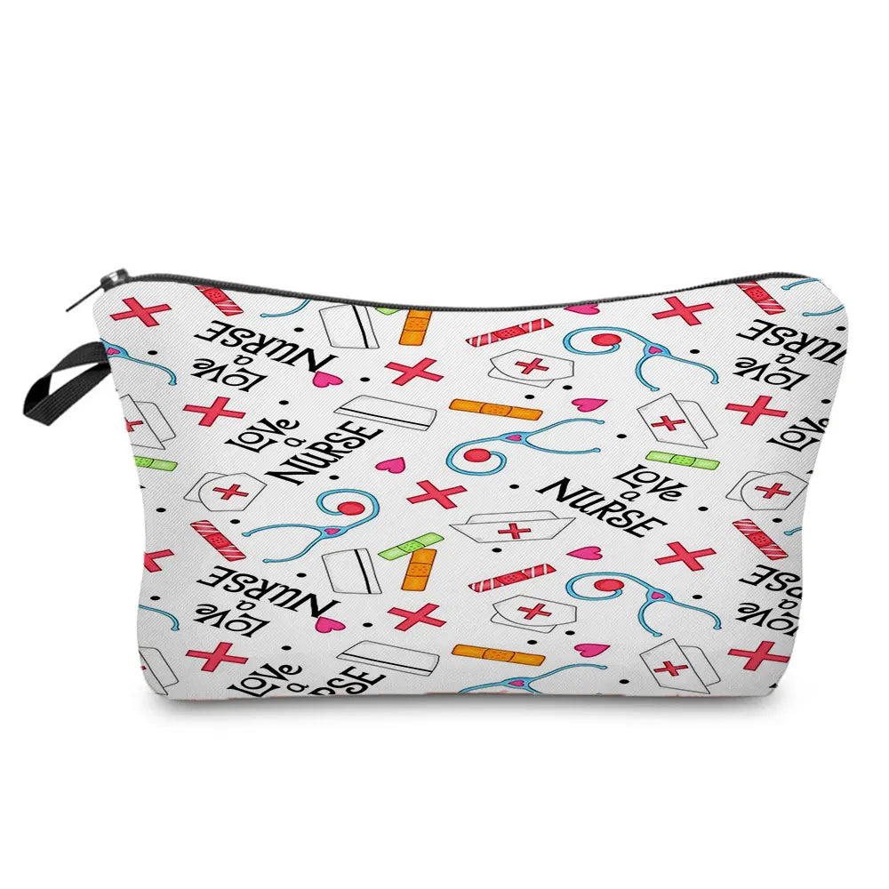 A pink and white fabric makeup bag with a zipper closure featuring various nurse-themed graphics like crosses, stethoscopes, 