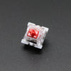 A close-up view of a red Outemu mechanical keyboard switch with a white housing and visible text.