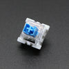A close-up view of a white plastic 3-pin mechanical keyboard switch with a blue cap and cross symbol.
