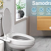 A white toilet with a mounted bidet attachment and surrounding features for a Samodra Bidet.
