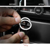 A black aluminum alloy engine start button cover with a carbon fiber pattern.