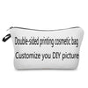 A white cosmetic bag with black trim and a zipper closure, designed for double-sided printing.
