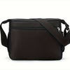 Black men's water-resistant nylon crossbody sling bag with adjustable strap.