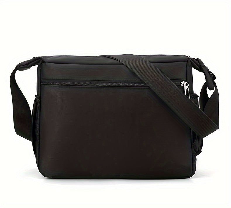 Black men's water-resistant nylon crossbody sling bag with adjustable strap.