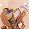A tan Capybara Kids School Backpack showing its interior organization and features.