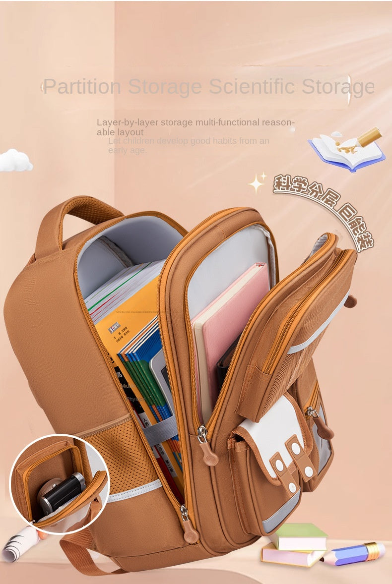 A tan Capybara Kids School Backpack showing its interior organization and features.