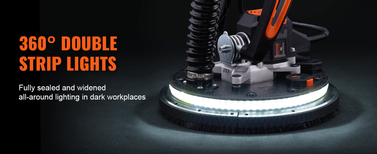A close-up of a 360° double strip light illuminating a surface in a dark workspace.