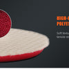 A close-up view of a red polyester foam polishing pad with a textured red center and a white outer layer.