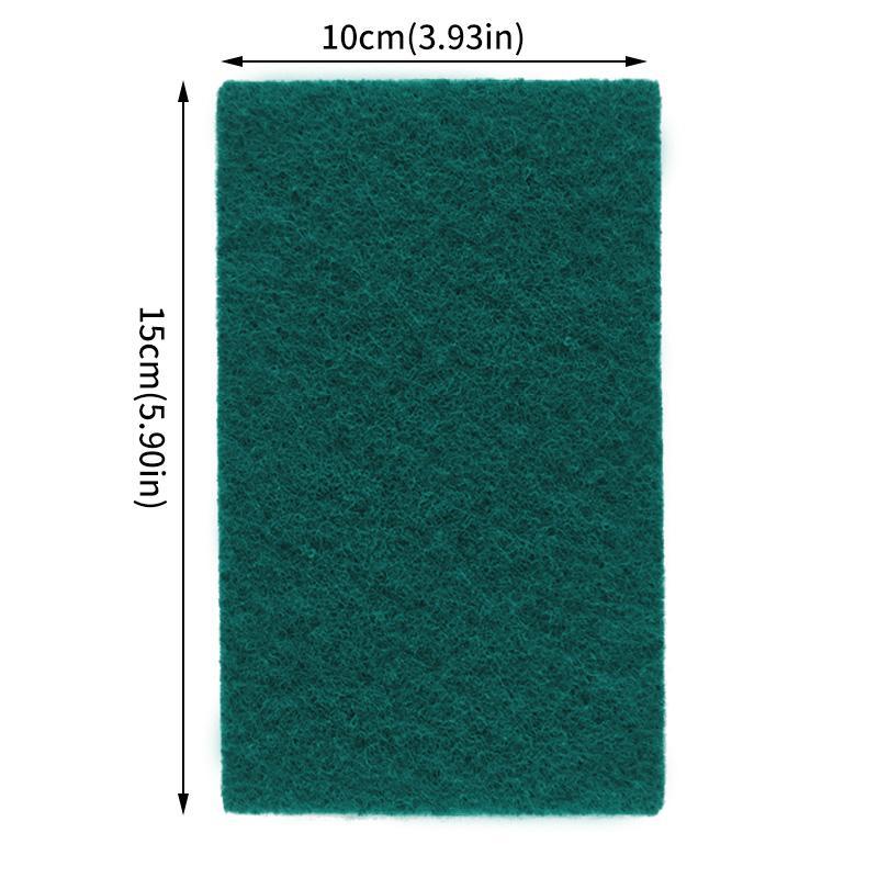 A rectangular teal microfiber kitchen scrub sponge measuring 10cm by 15cm.