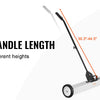 A silver rolling sweeper with an adjustable black handle and non-slip grip is shown.