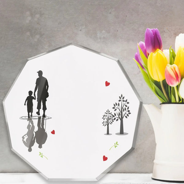Modern acrylic wall sign featuring a silhouette of a father and child with reflections, surrounded by floral elements.